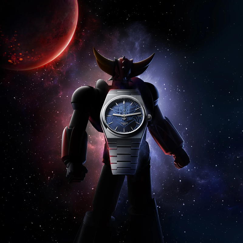 Tissot PRX UFO Robot Grendizer 40mm watch on a colored background