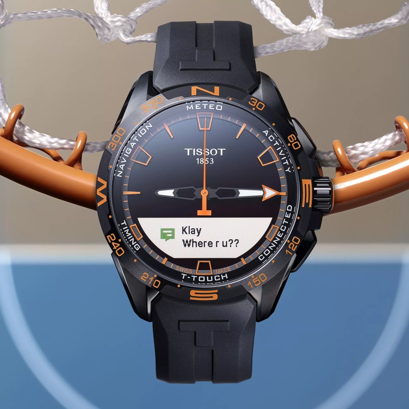Tissot T-Touch Connect Solar watch on a colored background