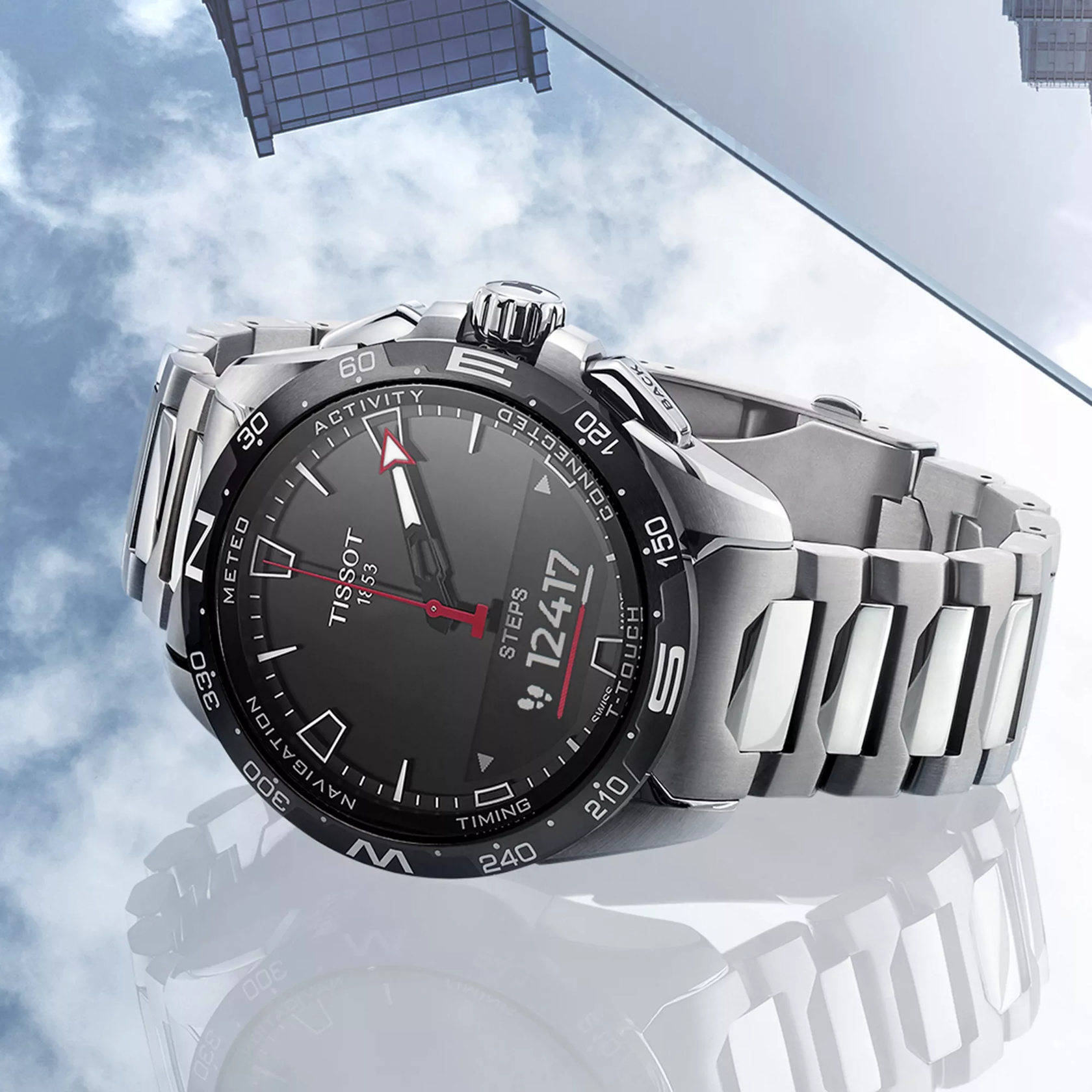 Tissot T-Touch Connect Solar watch on a colored background