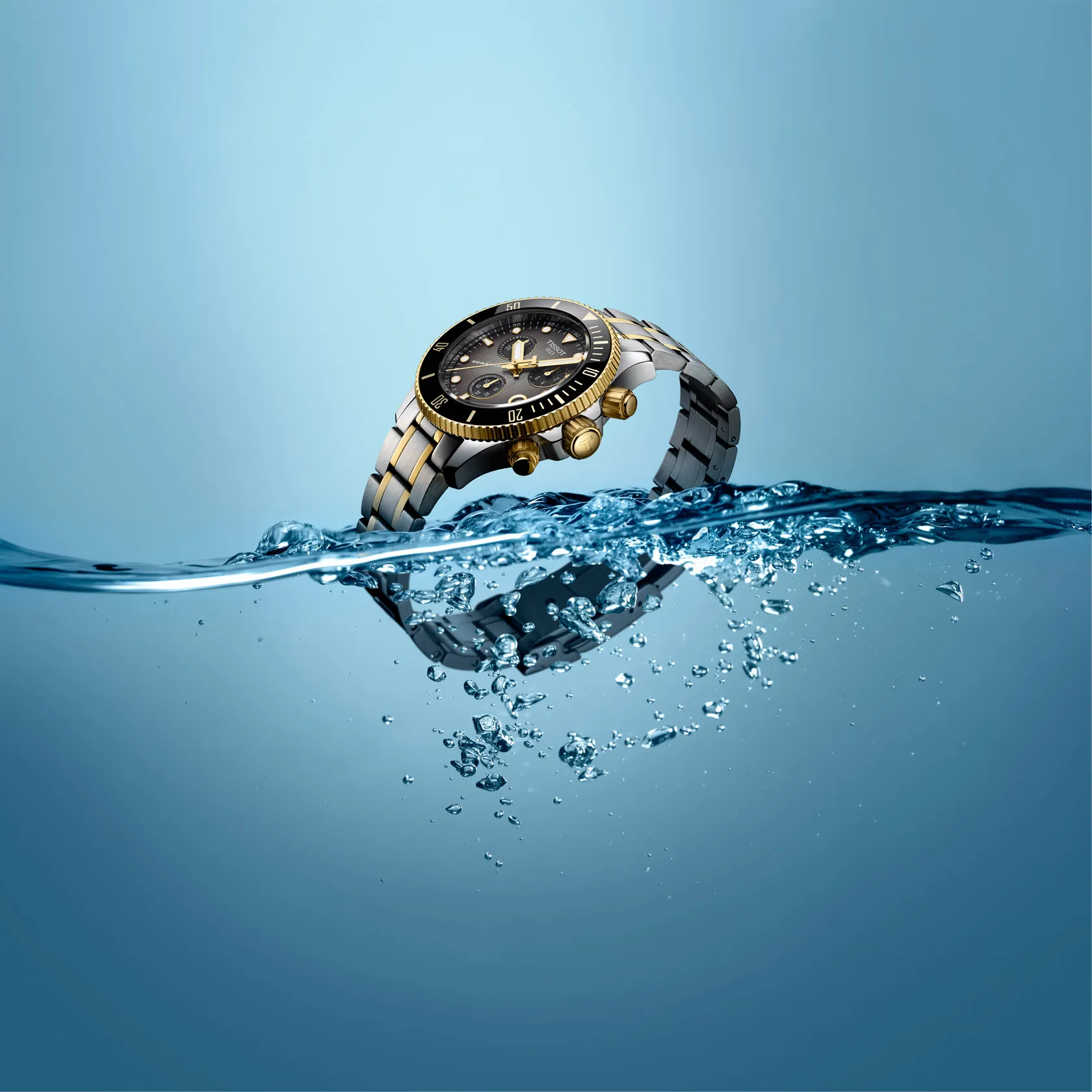 Tissot Seastar 1000 Quartz Chronograph 38mm watch on a colored background