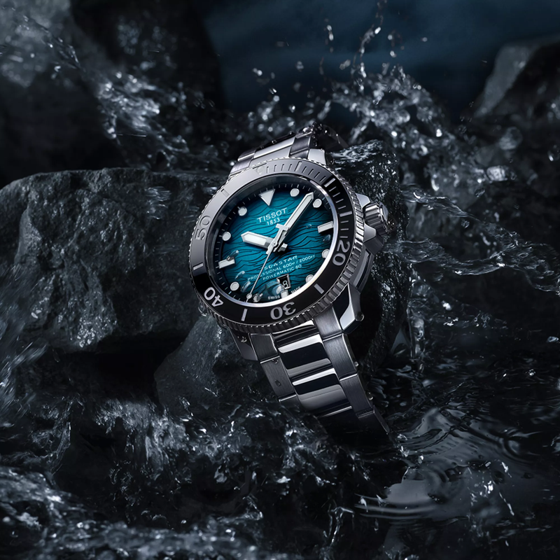 Tissot Seastar 2000 Professional Powermatic 80 watch on a colored background