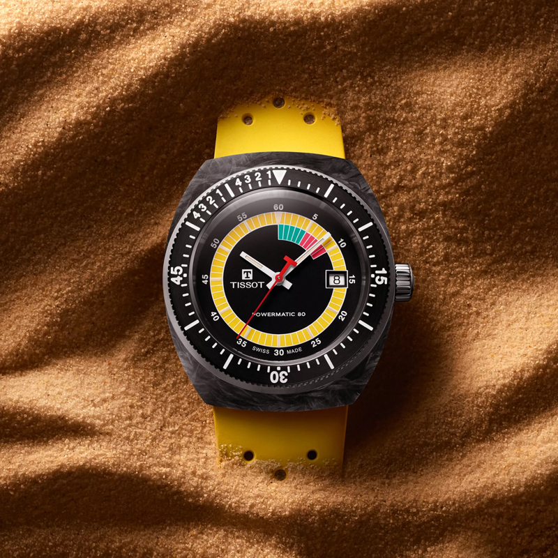 Tissot Sideral S Powermatic 80 watch on a colored background