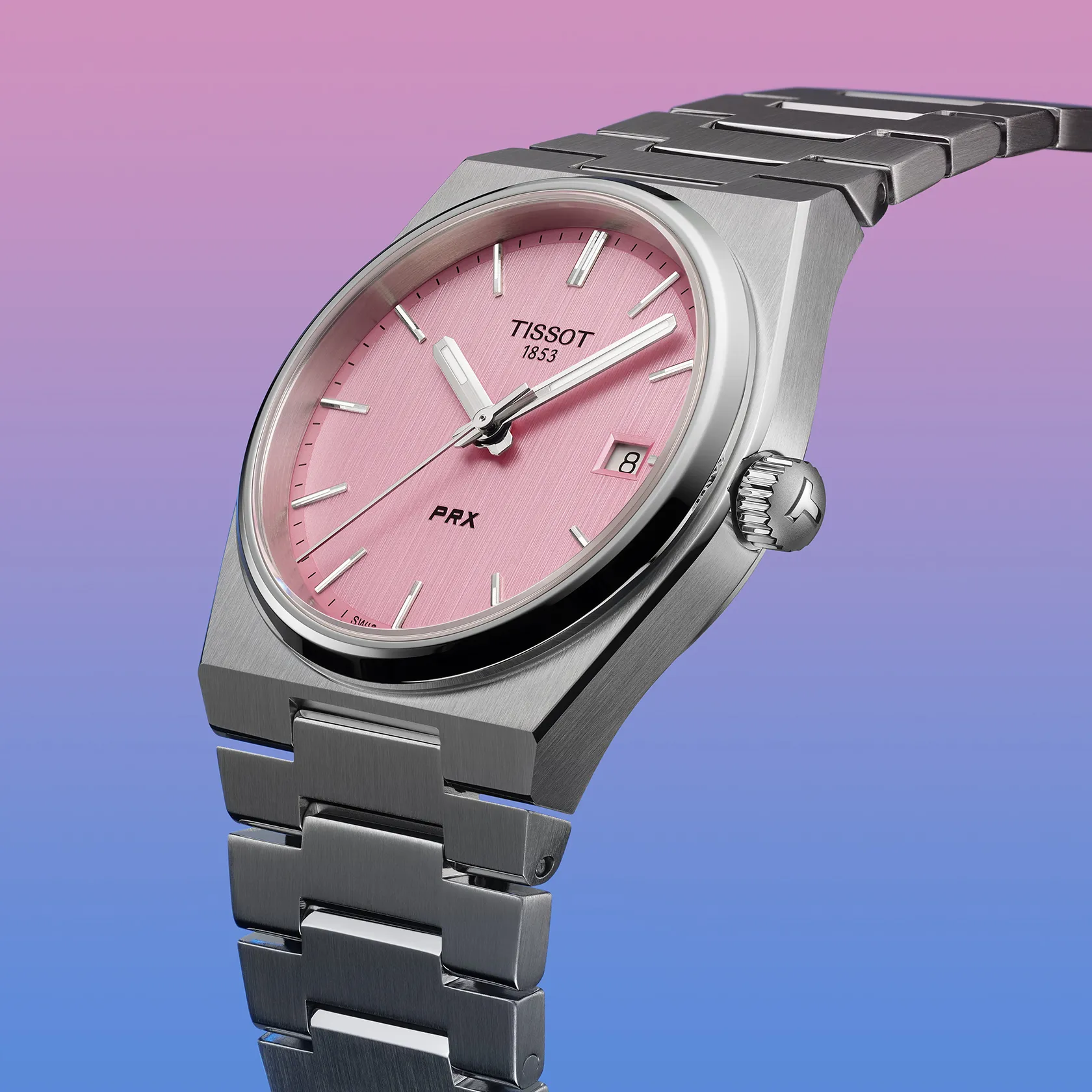 Tissot PRX 35mm watch on a colored background