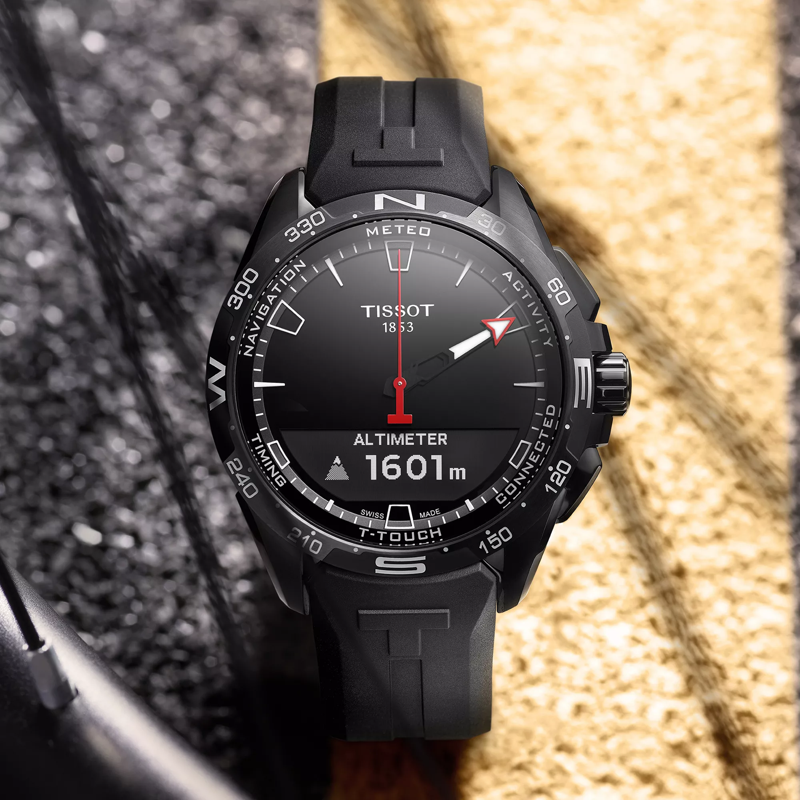 Tissot T-Touch Connect Solar watch on a colored background
