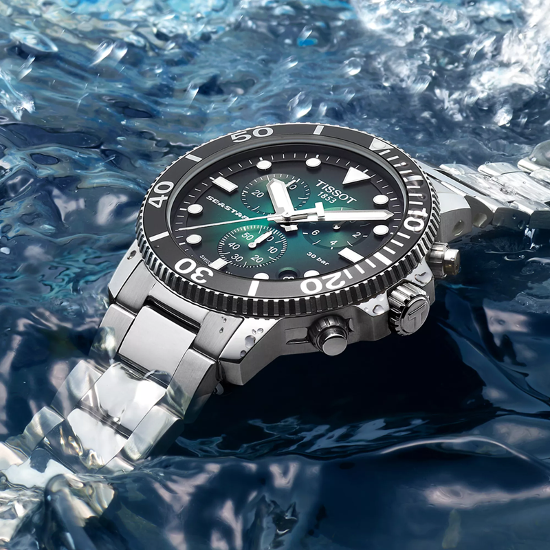 Tissot Seastar 1000 Quartz Chronograph watch on a colored background