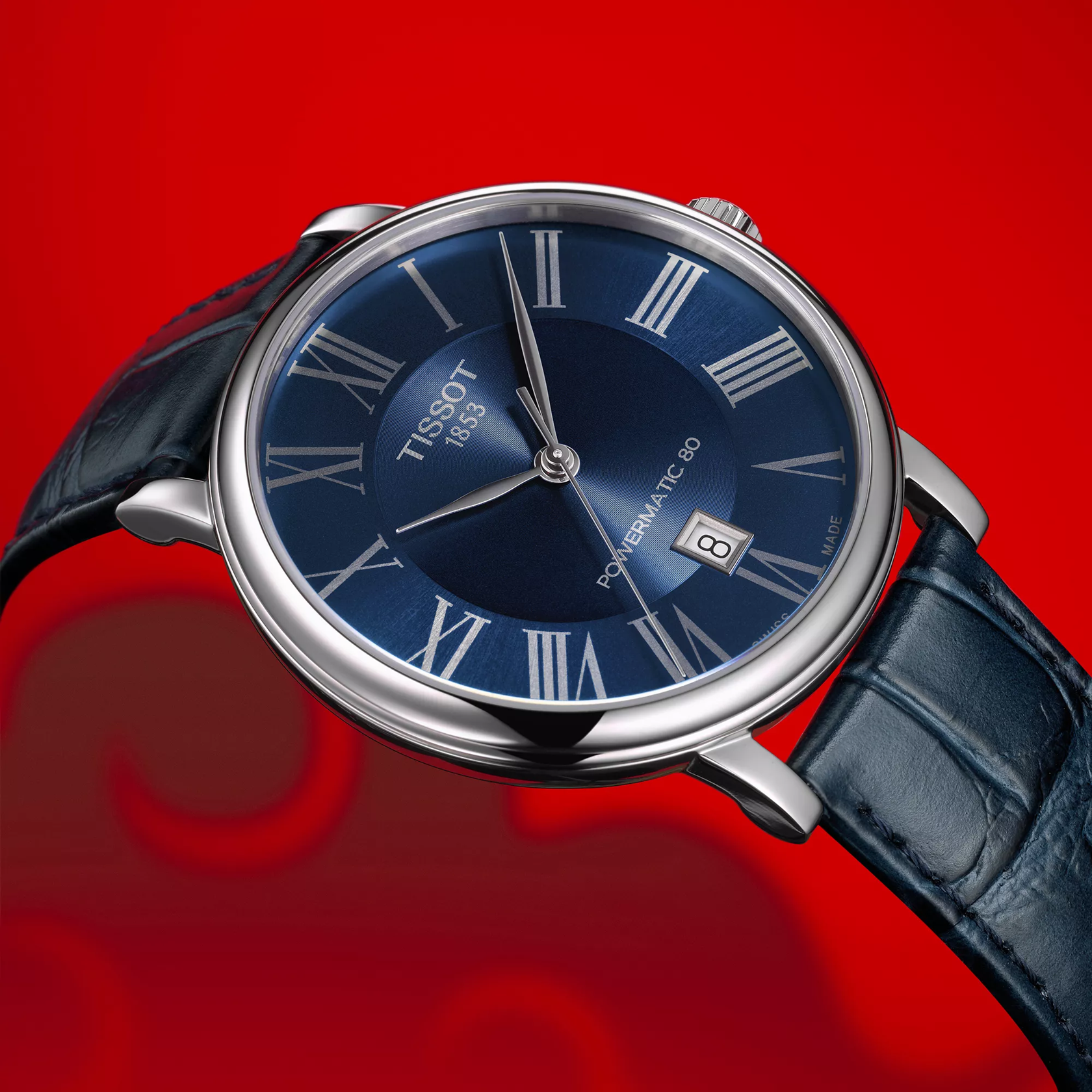 Tissot Carson Premium watch on a colored background