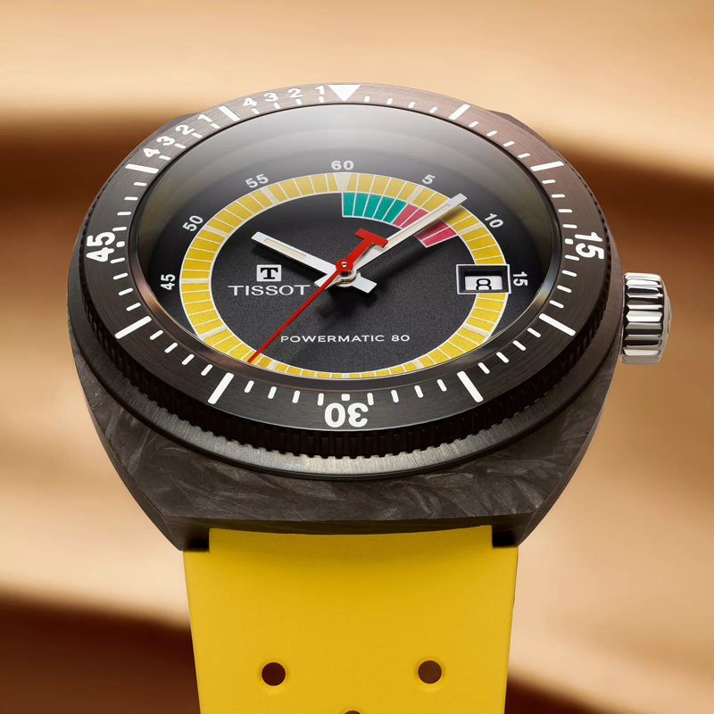 Tissot Sideral S Powermatic 80 watch on a colored background