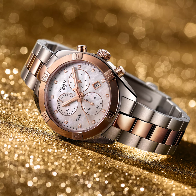 Tissot PR 100 Sport Chic Chronograph watch on a colored background